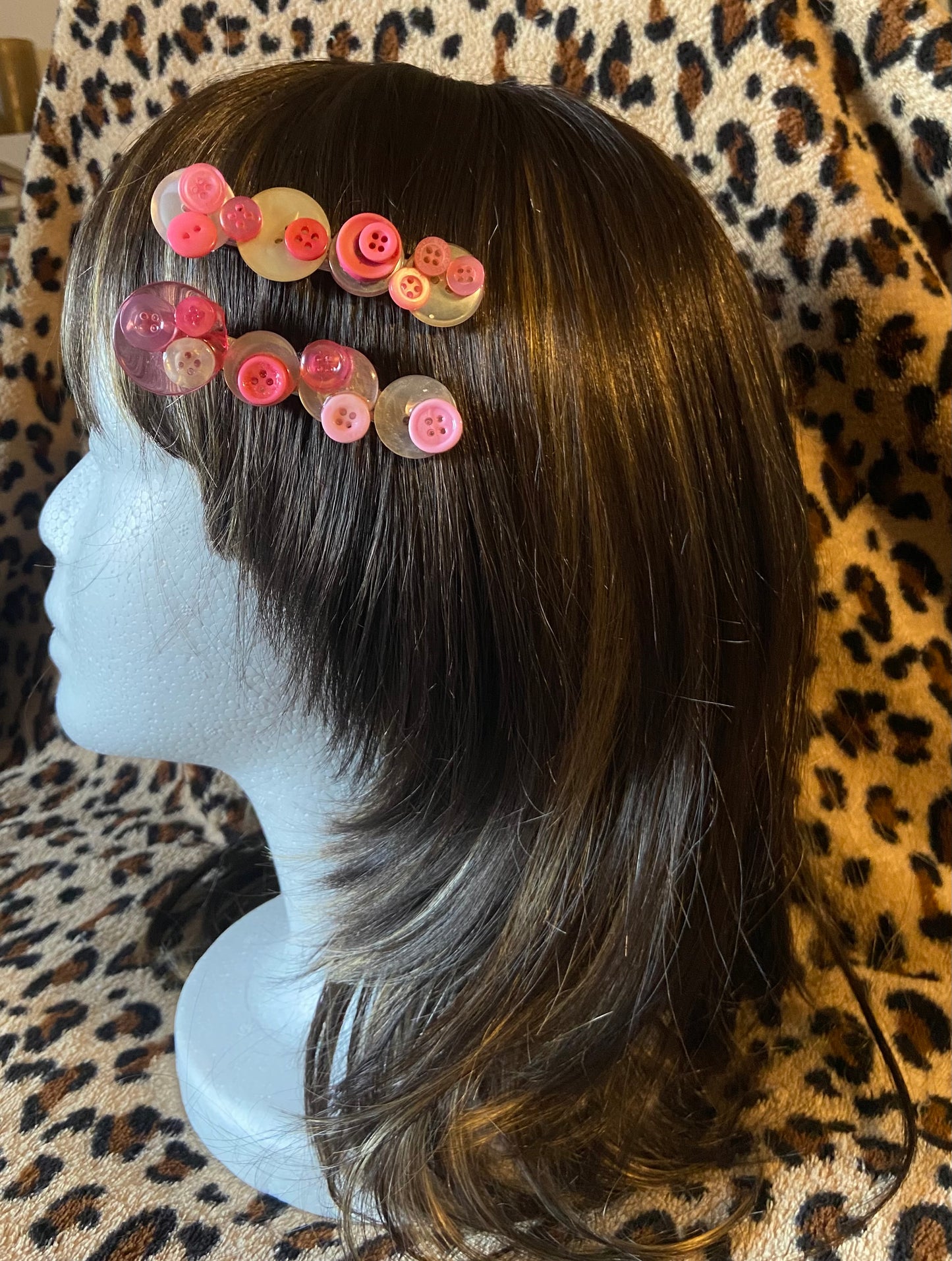 Barrette à boutons blanc et rose
