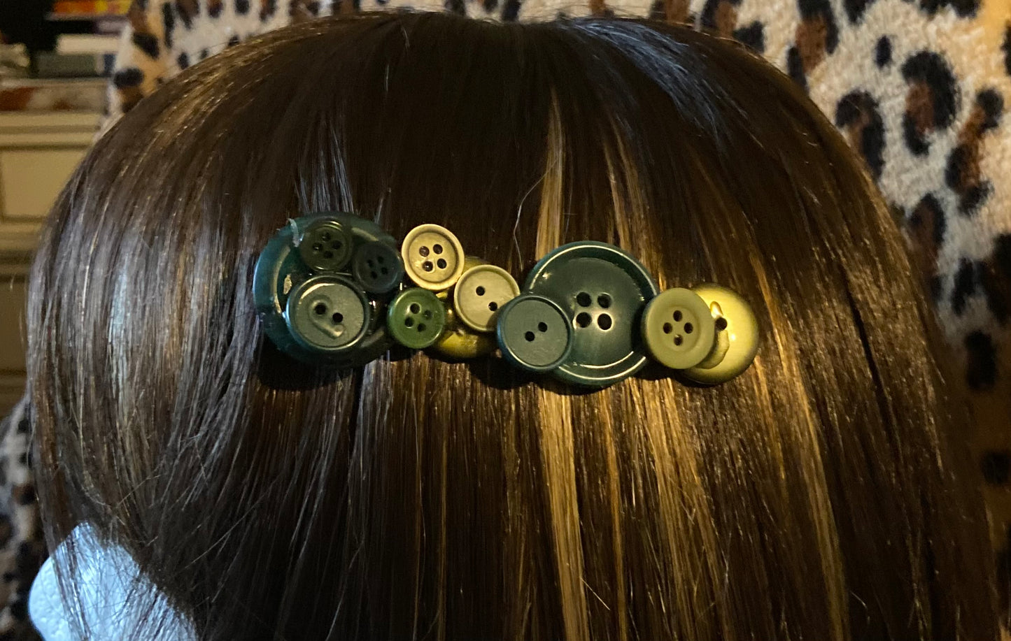 Barrette à boutons vert