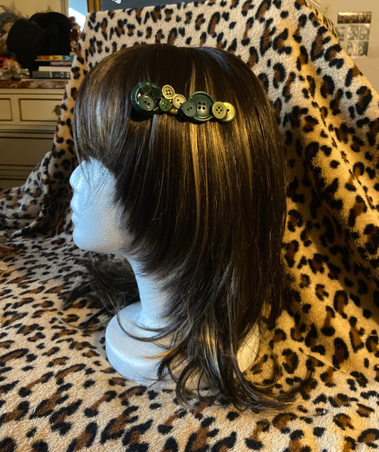 Barrette à boutons vert